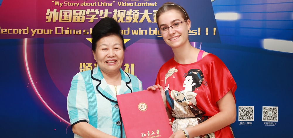 Anna Straif receives the first prize at the award ceremony for the My Story about China competition